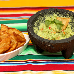 An image of Guacamole with tortilla chips